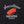 Load image into Gallery viewer, A close up of il porcellino salumi's logo screen printed on a black shirt.
