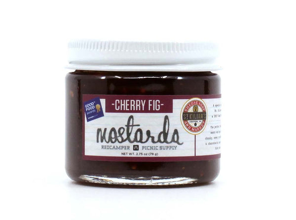 Jar of Cherry Fig Mostarda from Redcamper with a white label on a white background
