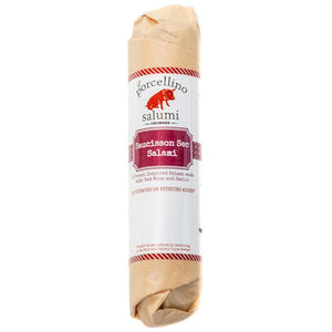 A product photo of il porcellino salumi's Saucisson Sec salami in packaging with a white background.