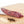 Load image into Gallery viewer, Cacciatore salami shot from the side and cut into slices on a cutting board next to herbs and spices.
